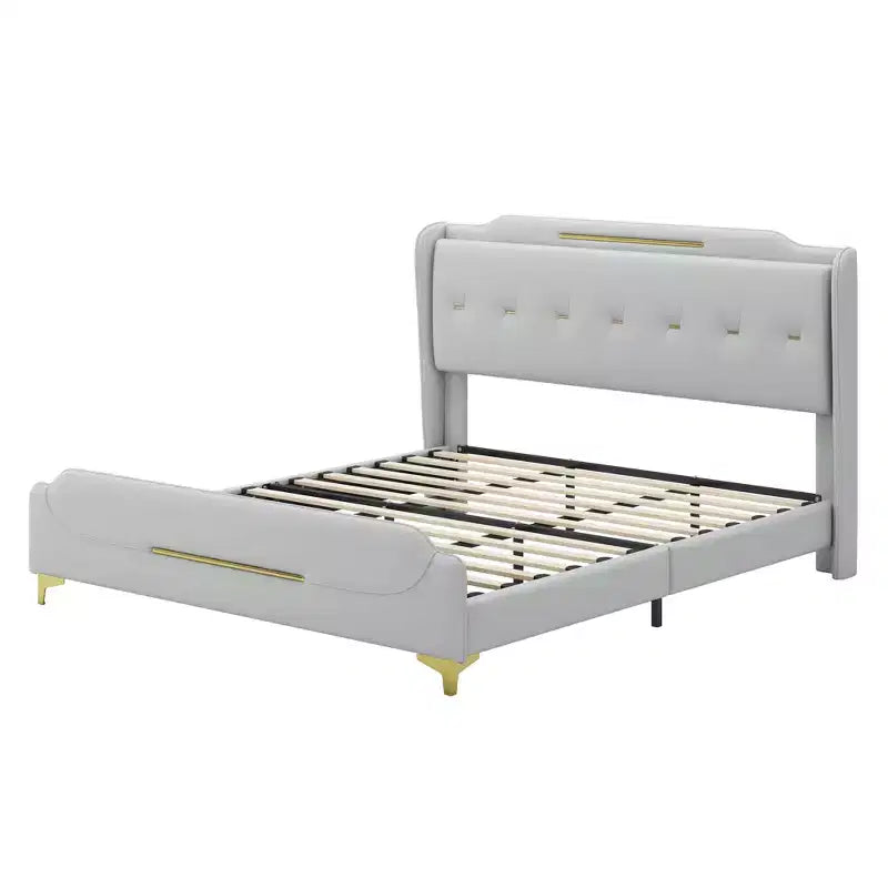 Letto King imbottito in ecopelle con testiera ad alette