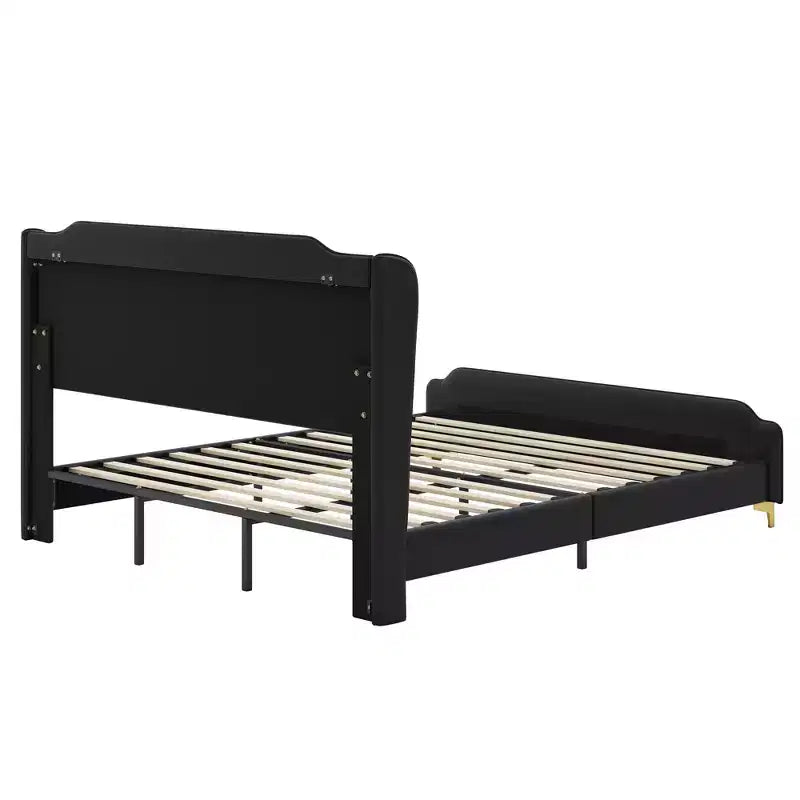 Letto King imbottito in ecopelle con testiera ad alette